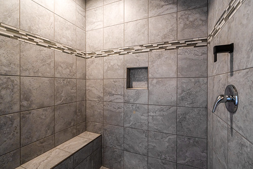 How to remove grout from shower floor